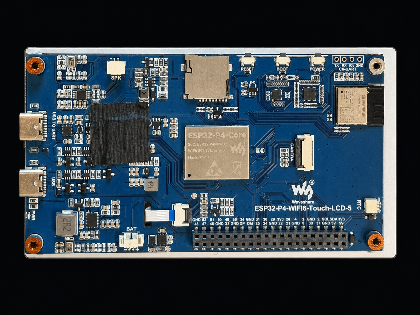 Back of the Waveshare ESP32-P4-WIFI6-Touch-LCD-5 board showing the P4 module, connectors and PCB traces